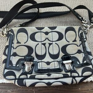 Used coach bag. Classic print style.